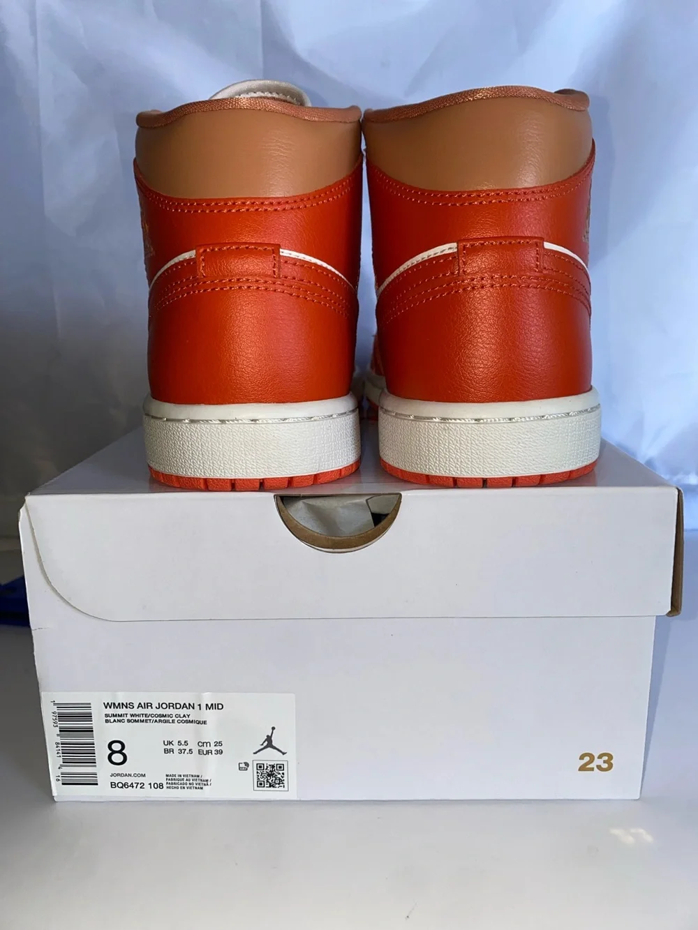 Nike  Women’s Orange and White Mid-Top Sneakers -